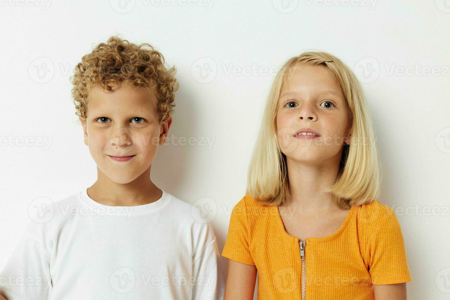 cheerful children casual clothes posing emotions studio isolated background unaltered photo