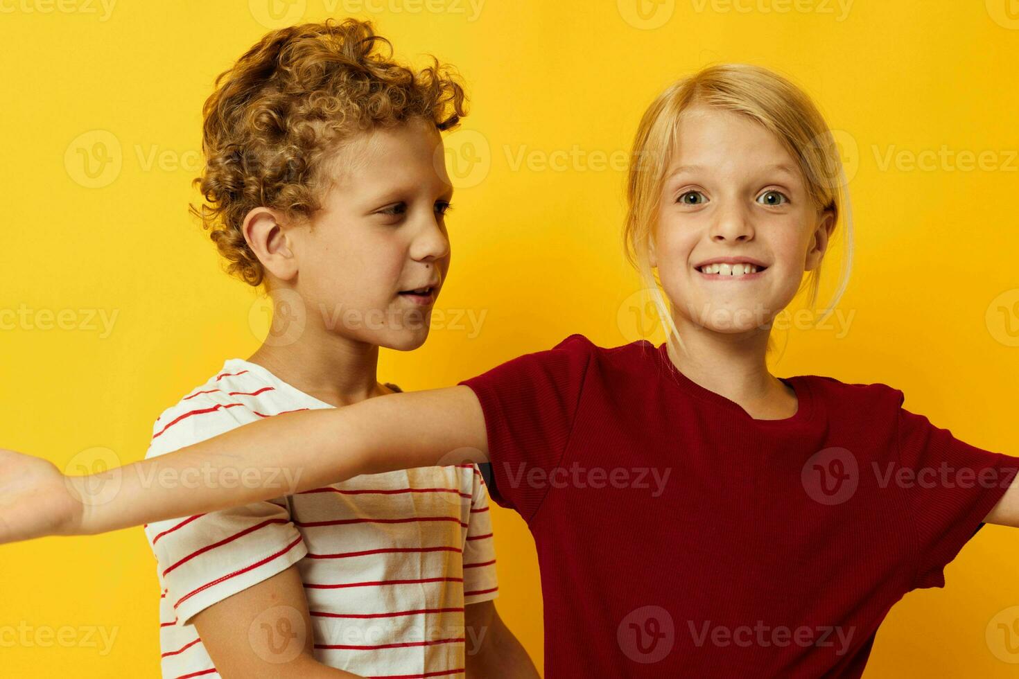 cheerful children casual wear games fun together isolated background photo