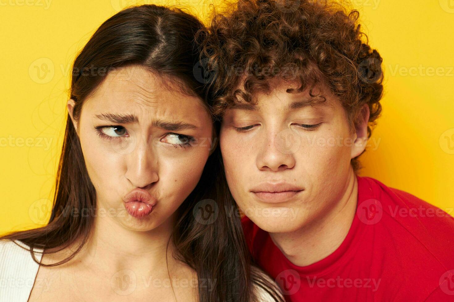 teenagers Friendship posing hugs together yellow background unaltered photo