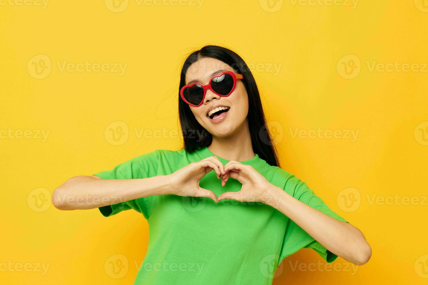 woman with Asian appearance sunglasses fun posing casual isolated background unaltered photo