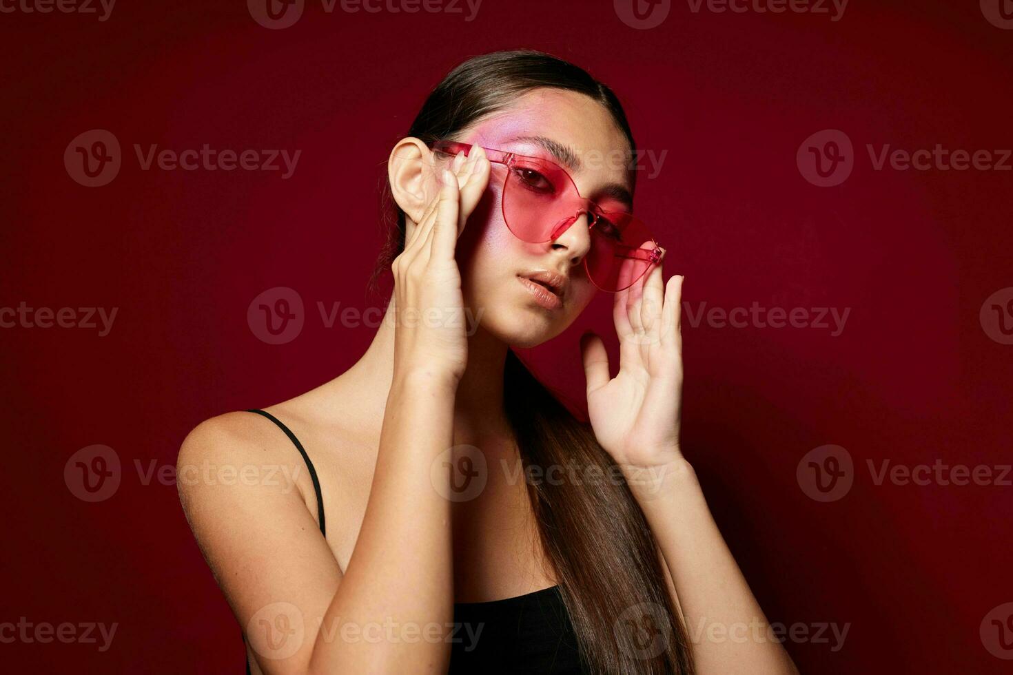 pretty woman bright makeup posing fashion emotions fashion glasses isolated background unaltered photo