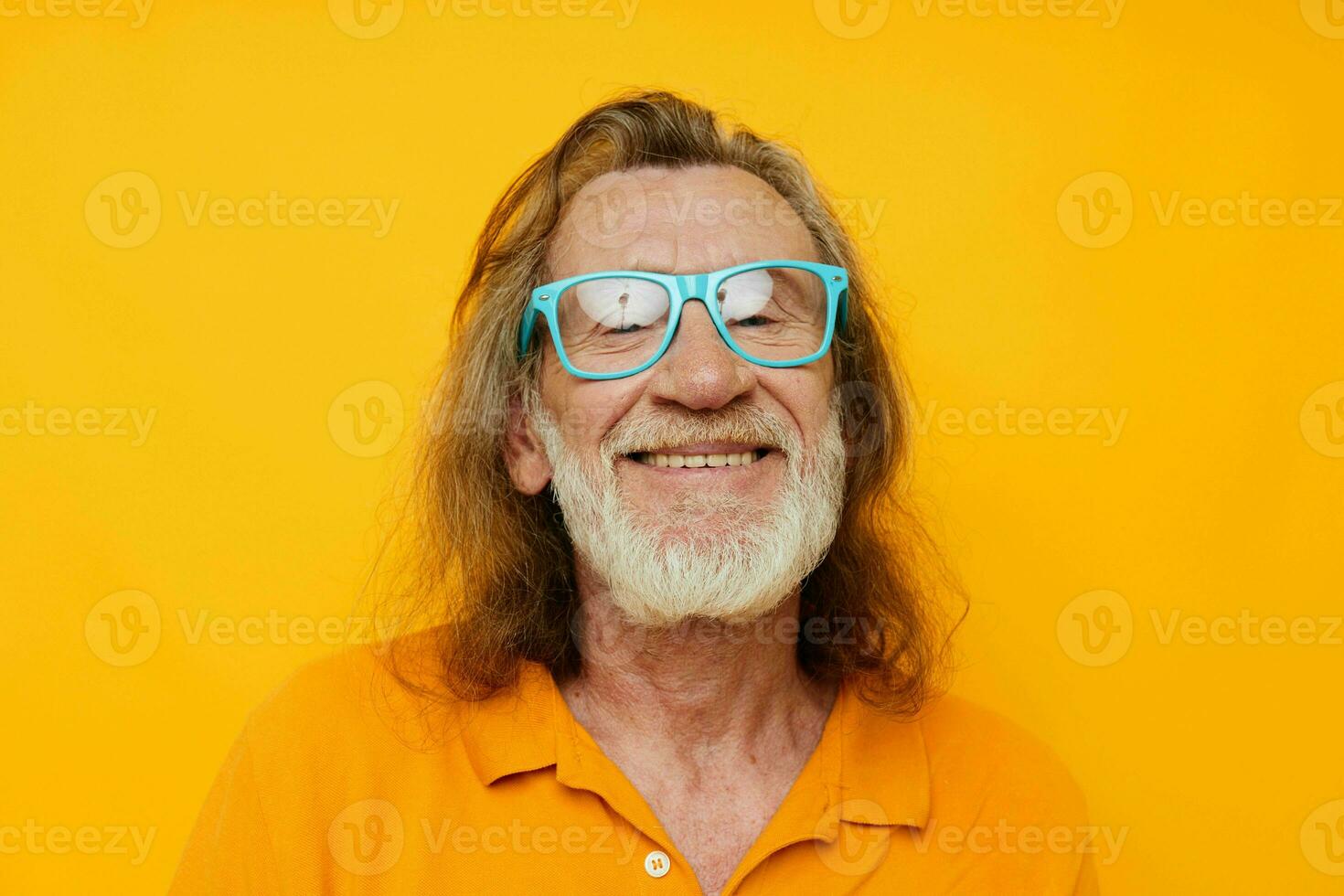 old man wearing blue glasses yellow tshirt photo