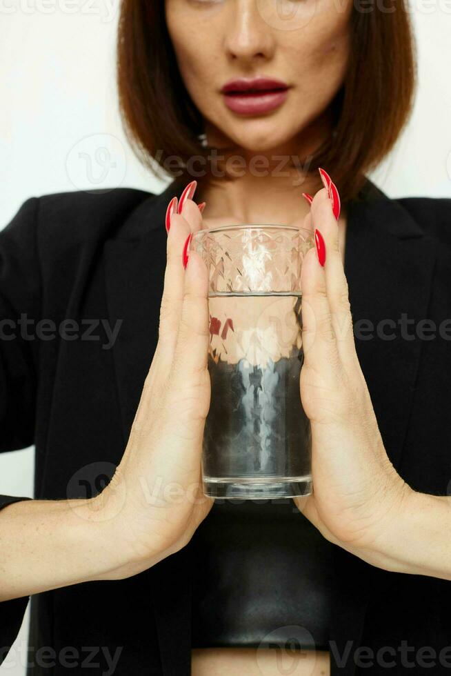 attractive woman black jacket transparent glass with water Lifestyle unaltered photo