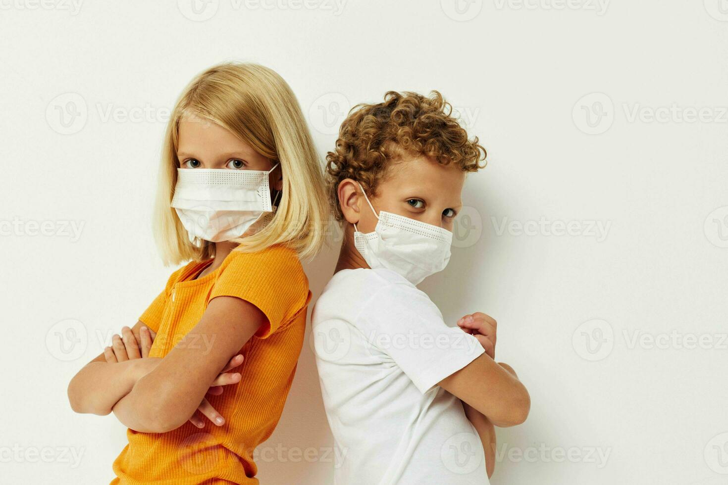 Cute stylish kids in medical mask protection posing grimace lifestyle unaltered photo