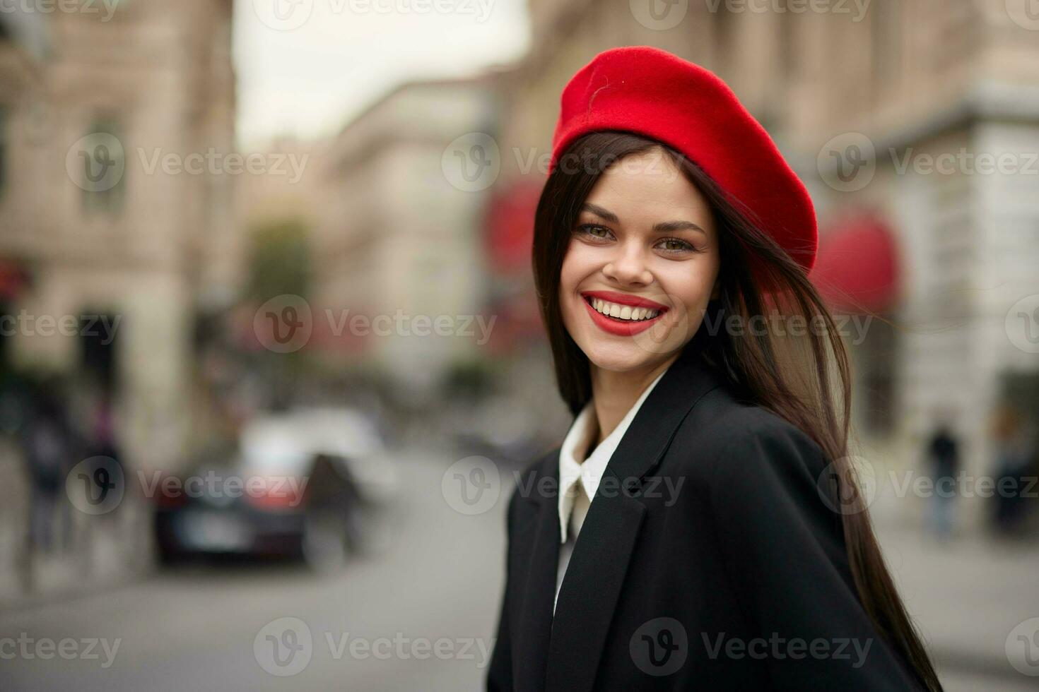 Fashion woman portrait smile teeth standing on the street in the city background in stylish clothes with red lips and red beret, travel, cinematic color, retro vintage style, urban fashion lifestyle. photo