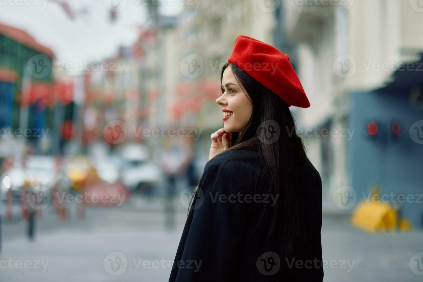 Woman smile walks walks in the city against the backdrop of office buildings, stylish fashionable vintage clothes and make-up, autumn walk, travel. photo