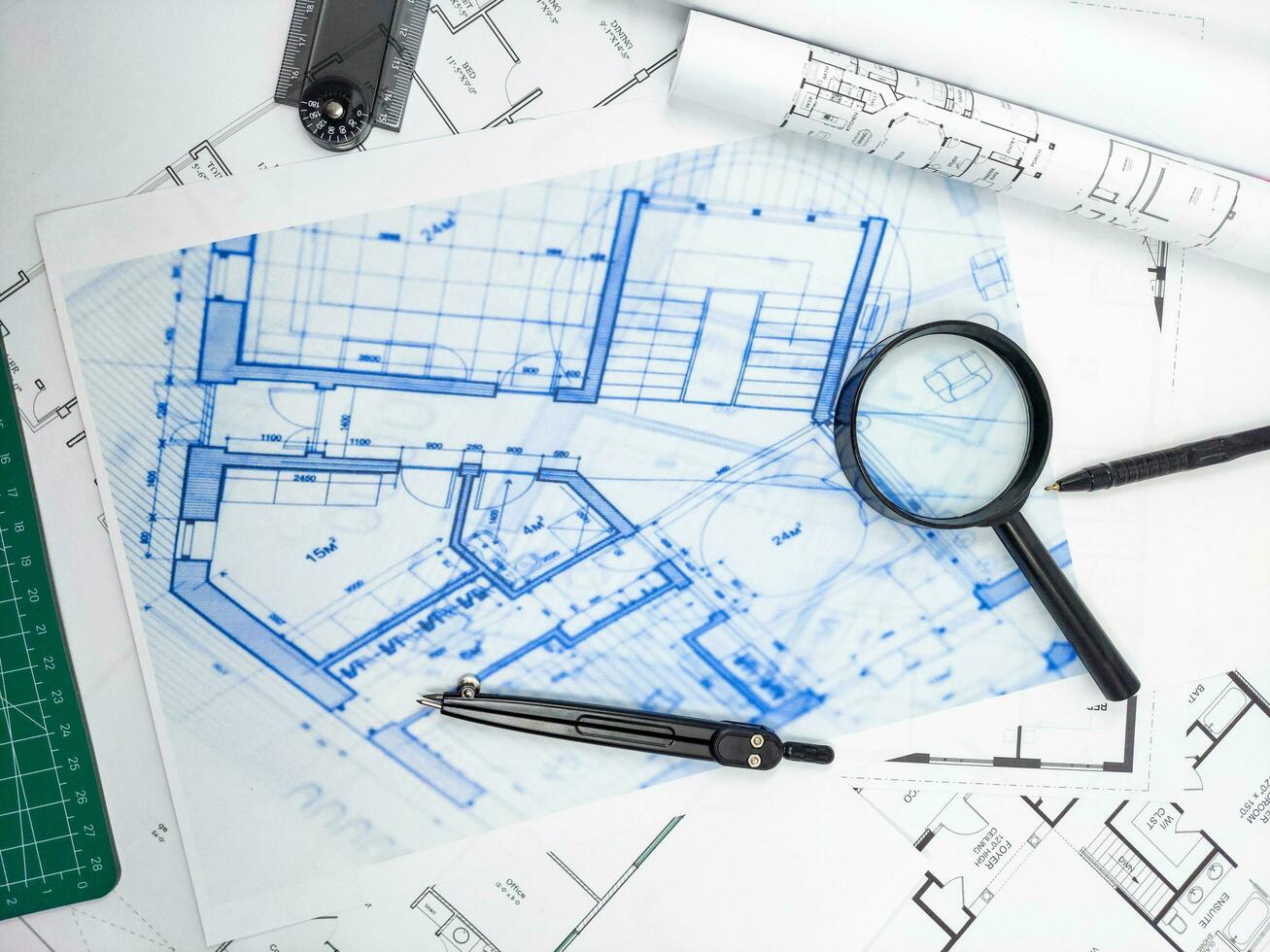 Hands of Engineer working on blueprint. Architecture interior concept. photo