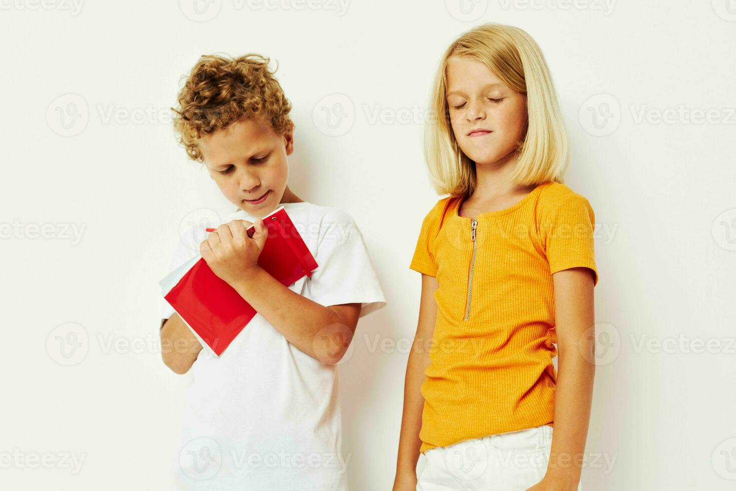 Small children draw in the notebook childhood entertainment color background unaltered photo