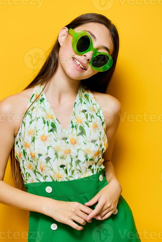 woman emotion fashion stylish style beautiful yellow sunglasses happy young green photo