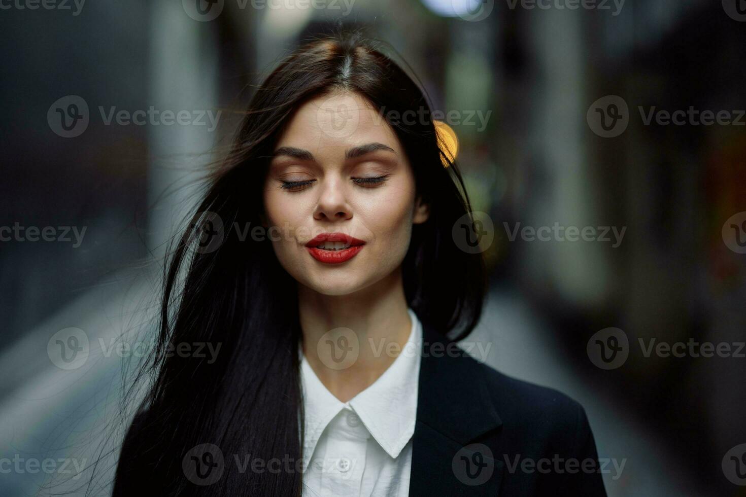 Fashion woman dramatic portrait tourist in stylish clothes in jacket and red beret walking down narrow city street flying hair, travel, French style, cinematic color, retro vintage style. photo