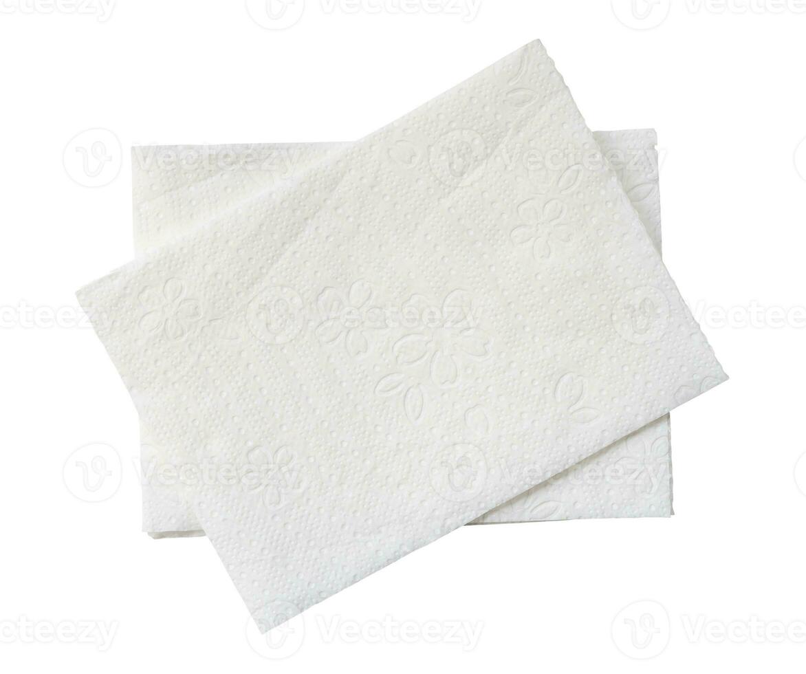 Top view of two folded pieces of white tissue paper or napkin in stack isolated on white background with clipping path photo