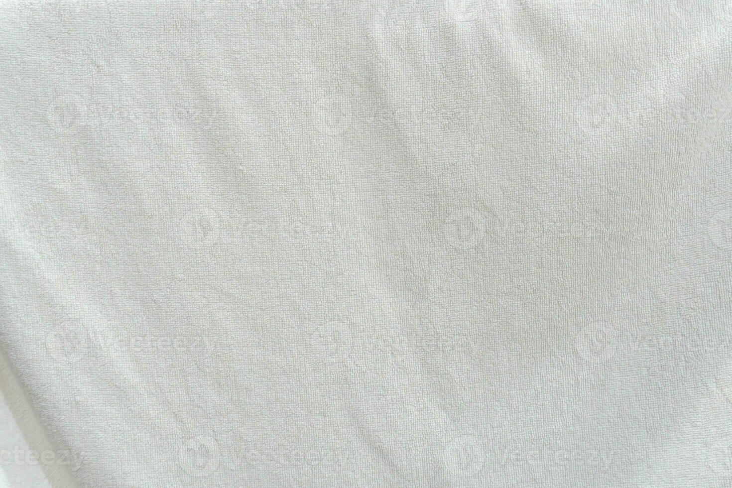 White towel texture background with small wave pattern taken with soft light photo