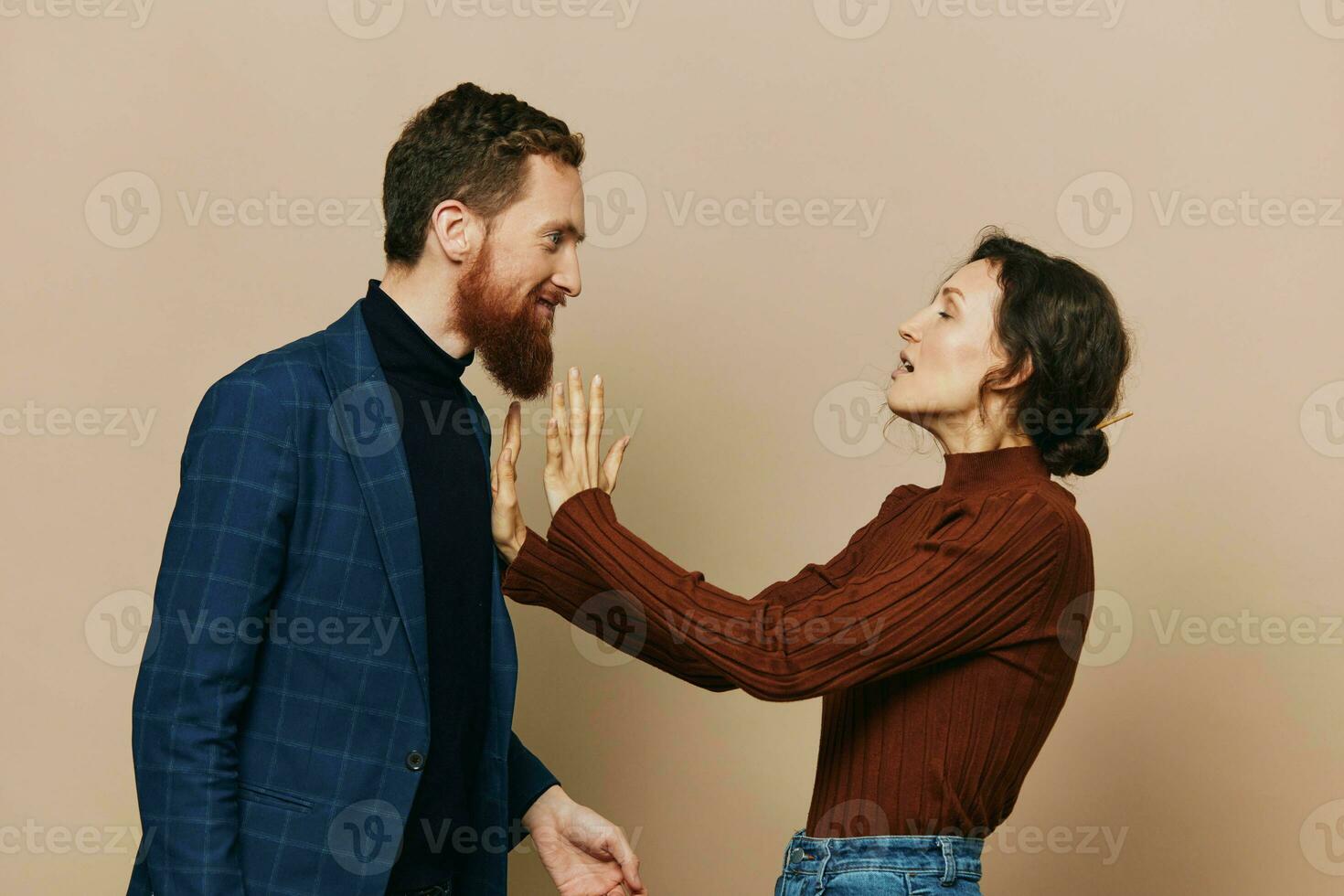 Man and woman couple in a relationship quarrel, yelling, psychological violence in the family, problems in a real relationship between people photo