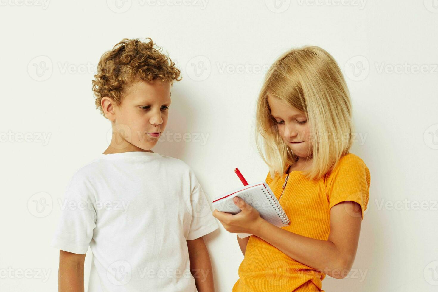 cheerful children stand next to notepad pencil drawing emotions color background unaltered photo