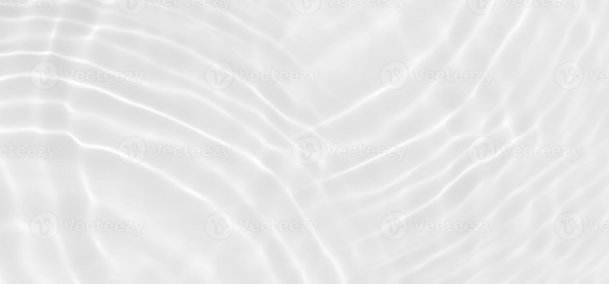 White water with ripples on the surface. Defocus blurred transparent white colored clear calm water surface texture with splashes and bubbles. Water waves with shining pattern texture background. photo