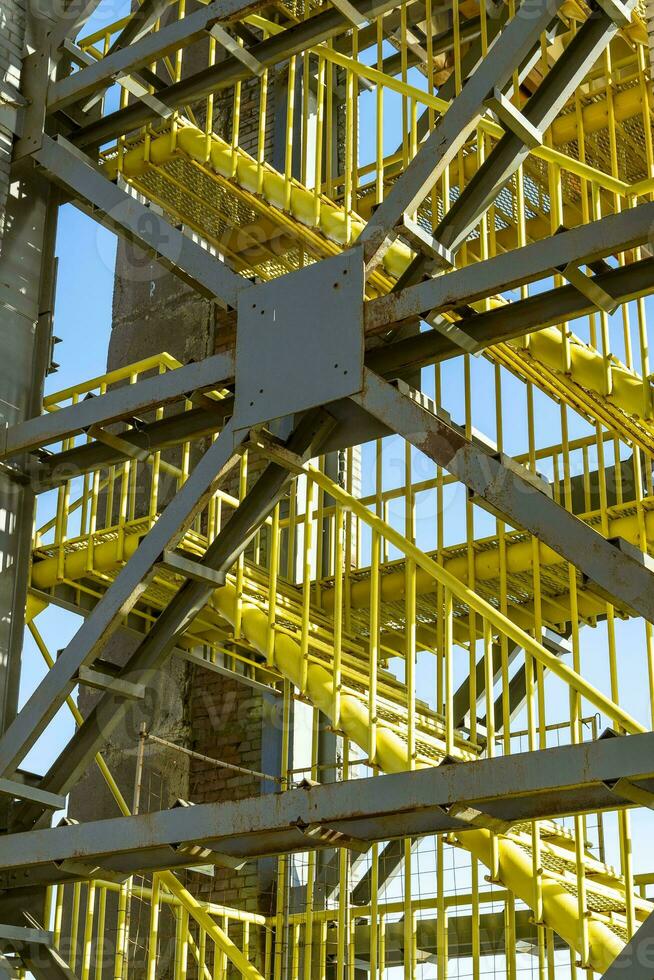 powerful metal industrial ladder and metal trusses with rivets photo