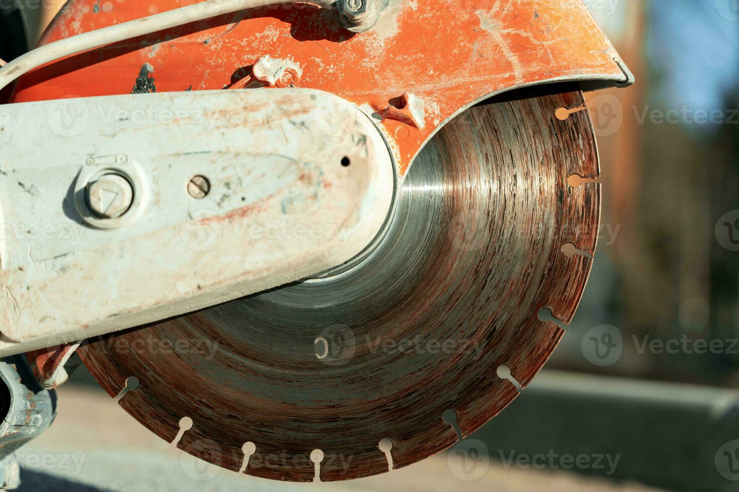 close-up of a saw with a disc for cutting concrete and paving slabs photo