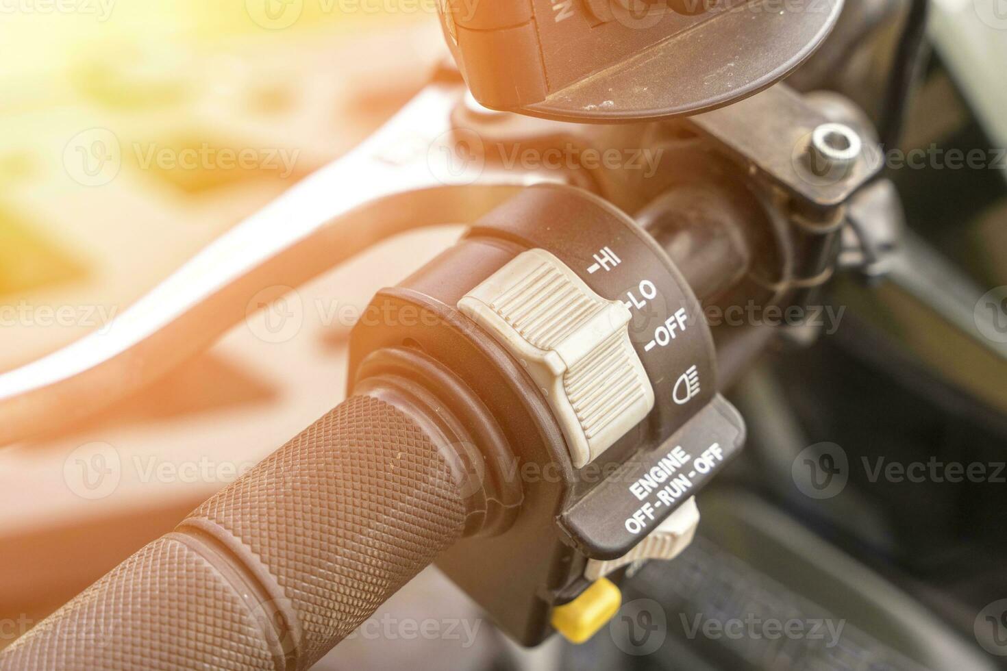 atv controls close-up. switches on the handlebar of the ATV photo