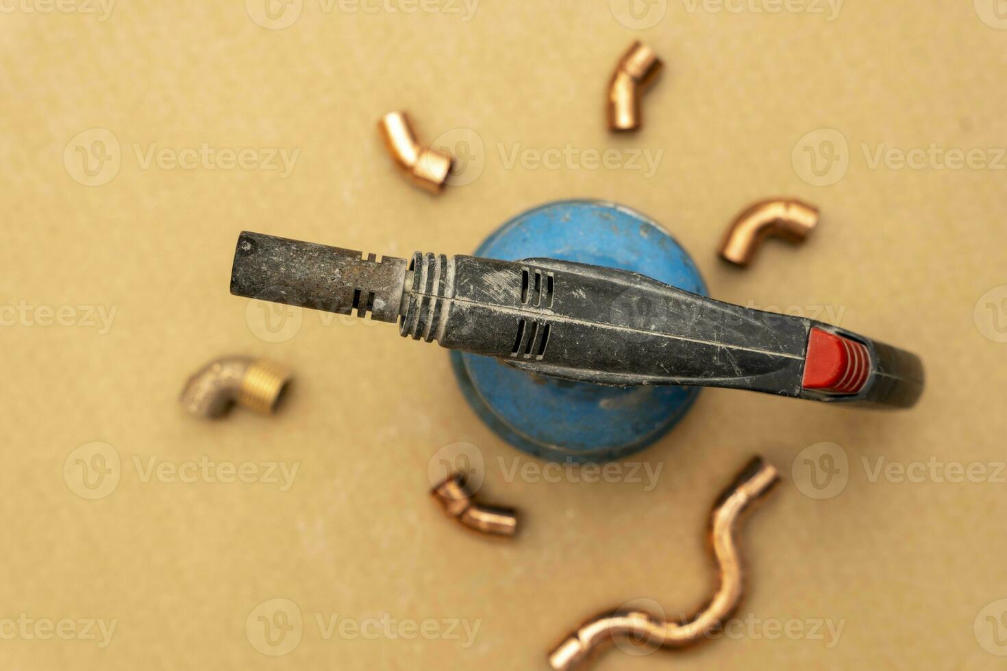 A large bundle of iron construction fittings in close-up photo
