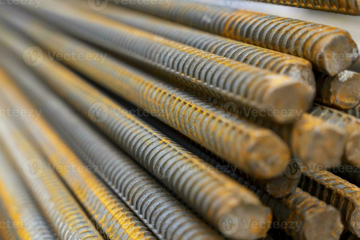 A large bundle of iron construction fittings in close-up photo