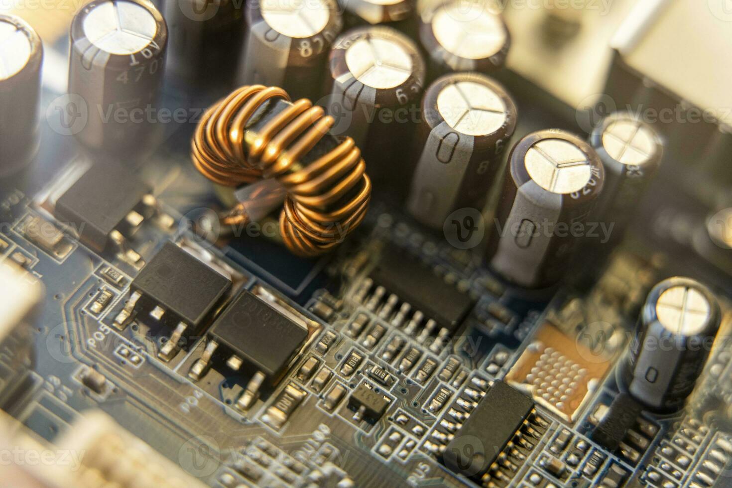 Background of various electronic components on printed circuit board photo