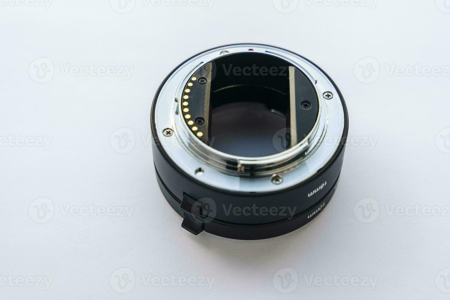 Close-up of the extension ring for macro photography. white background. photo