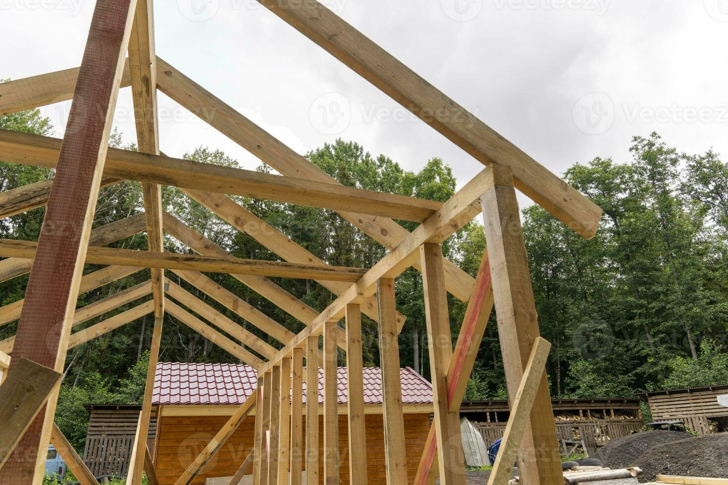 construction of a frame house. Timber frame house, new build roof photo