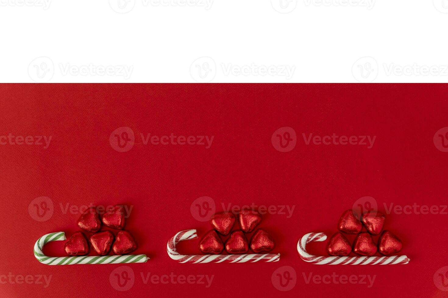 Christmas background with a sled, candy and a caramel cane photo