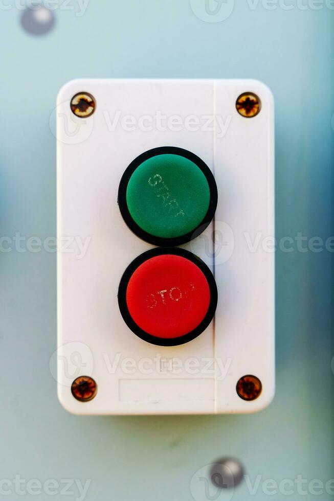green and red buttons for starting and turning off equipment photo