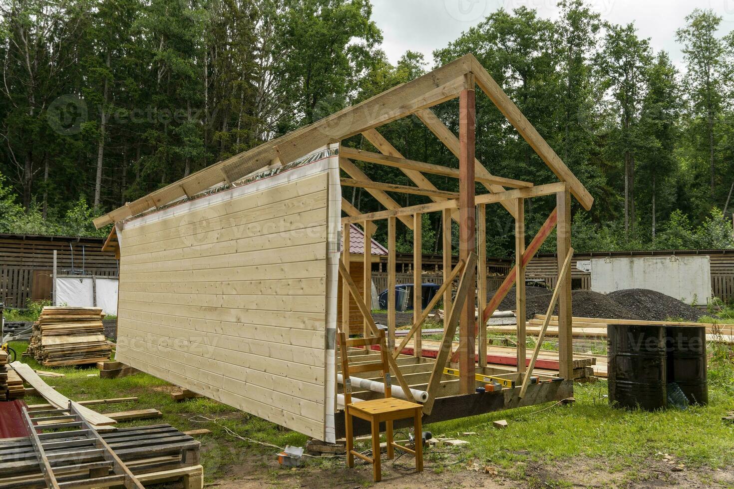construction of a frame house. Timber frame house, new build roof photo