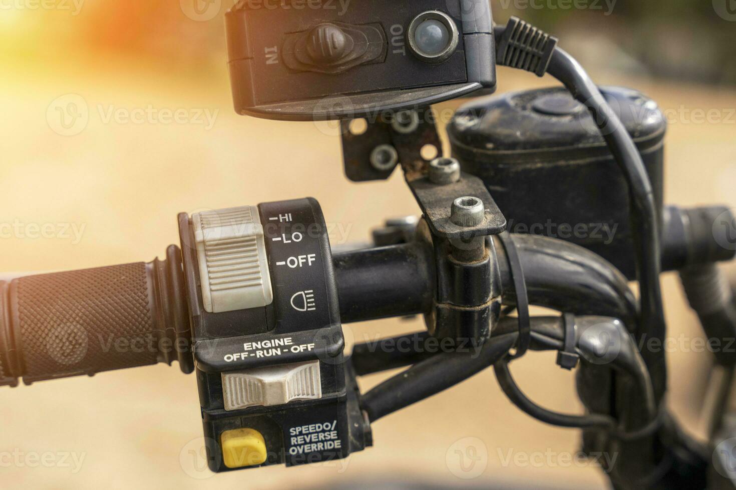 atv controls close-up. switches on the handlebar of the ATV photo