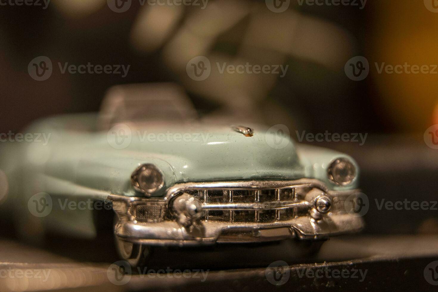 toy model of a beautiful vintage car with a chrome bumper photo