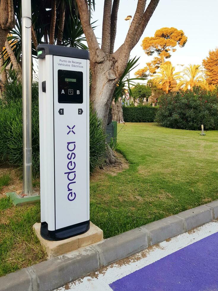 Jerez de la Frontera, Andalusia, Spain. 7 July 2021. Charging point for electric vehicles of the Endesa company located on the street. photo