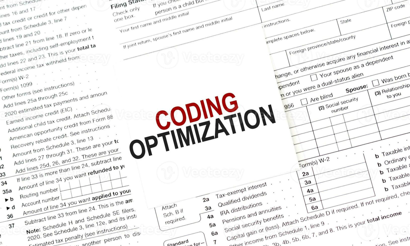 CODING OPTIMIZATION on white sticker and papers photo