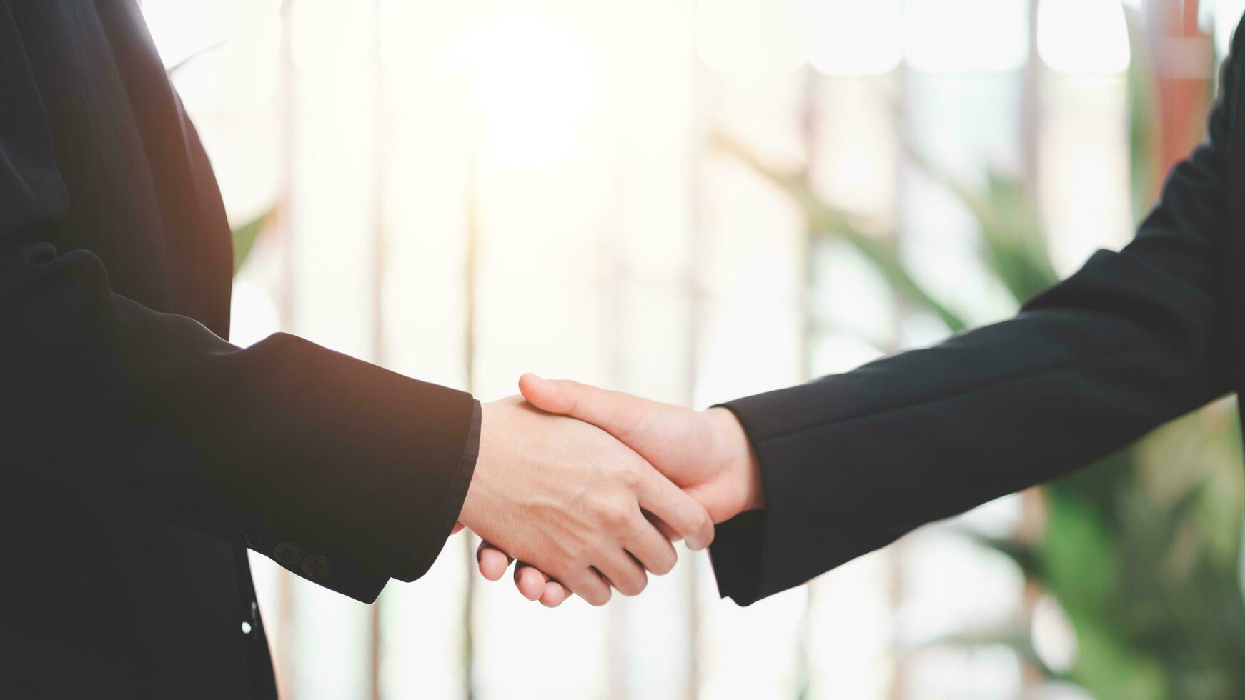 business people shaking hands indicating agreement business,concept progress in development, financial efficiency and investment with business strategy for goals and opportunities in industry future photo
