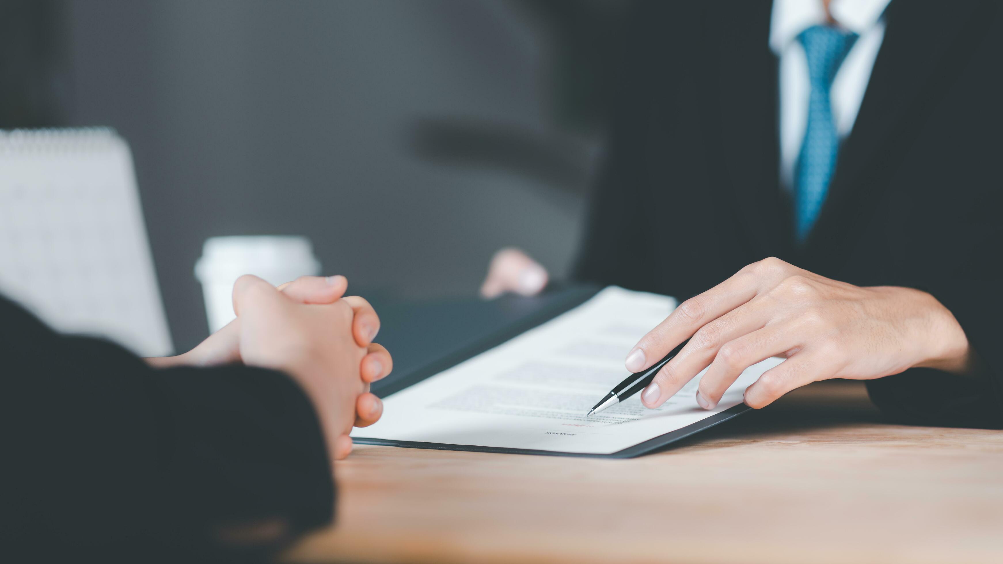 Businessman checking contract documents ,handle business documents and