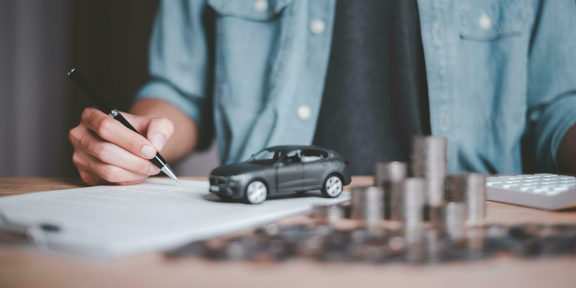 Customers sign insurance documents or car rental forms ,Providing financial services and car insurance ,financial car loans ,car purchase agreement ,Approval of hire-purchase agreements photo