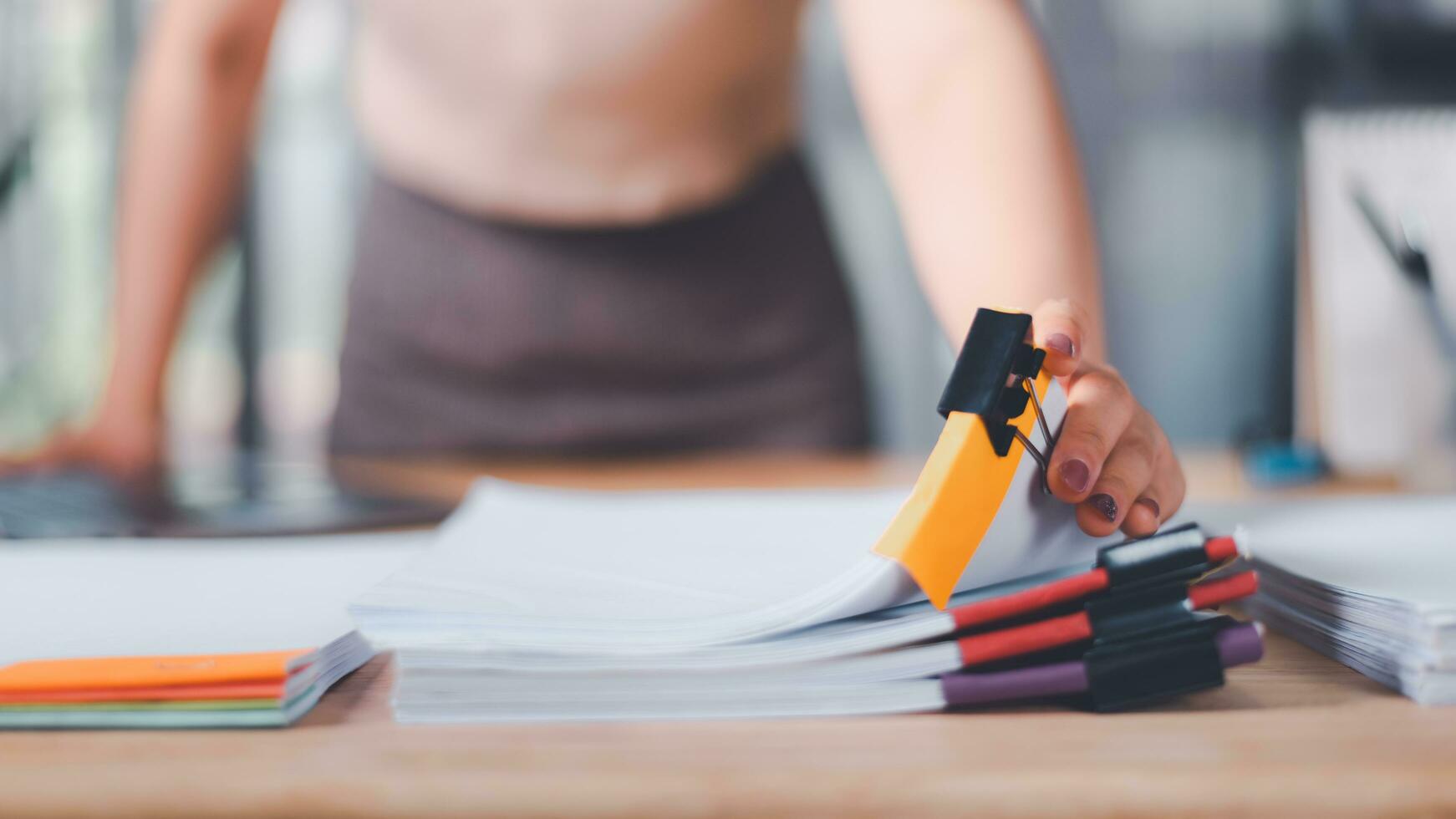Accountant manages and examines office documents ,accounting documents ,Reports for Tax Time Analysis ,plan review process and assess correctness ,business document evaluation process ,accounting photo