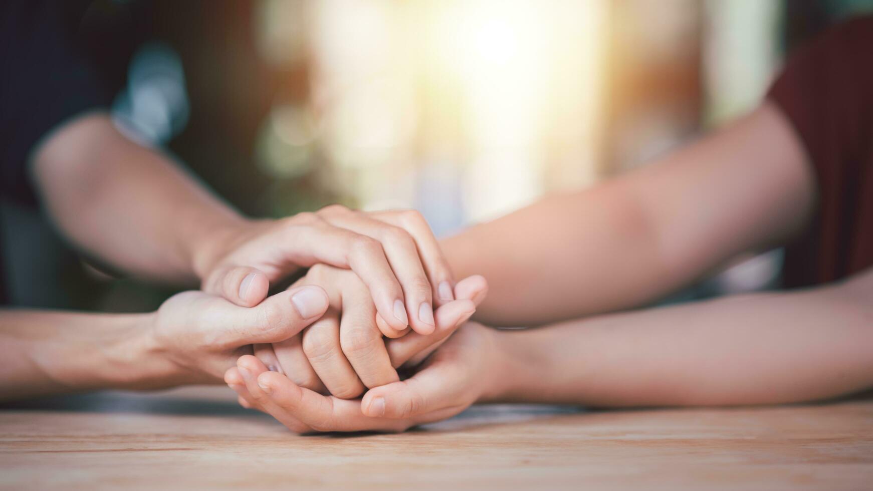 Husband and wife join hands to cheer ,Relationship care concept ,comforting family members ,mutual encouragement ,tenderness ,comfort and sympathy ,helping ,giving hope and believing photo