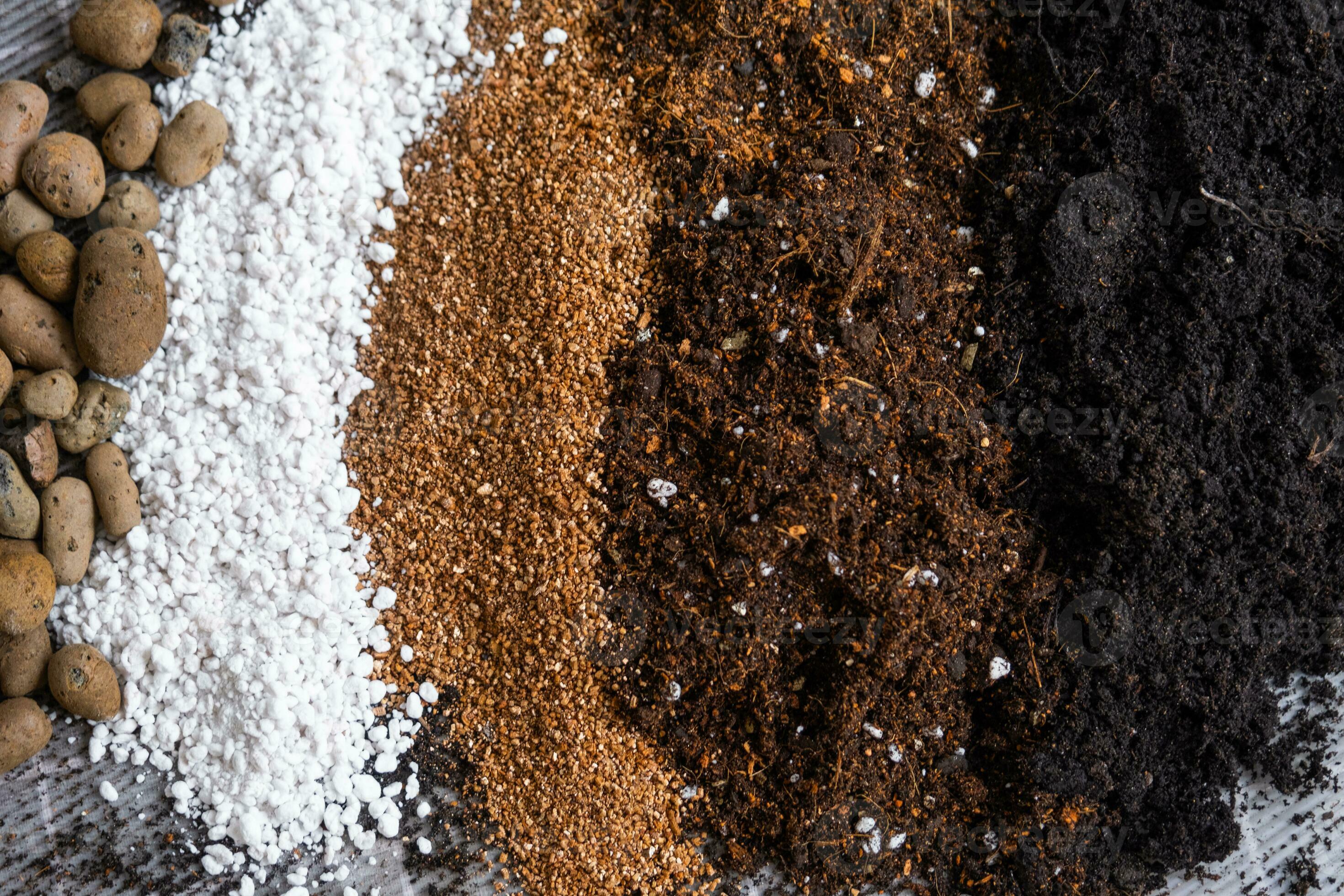 Ingredients for the soil of home potted plants, peat, earth, sand