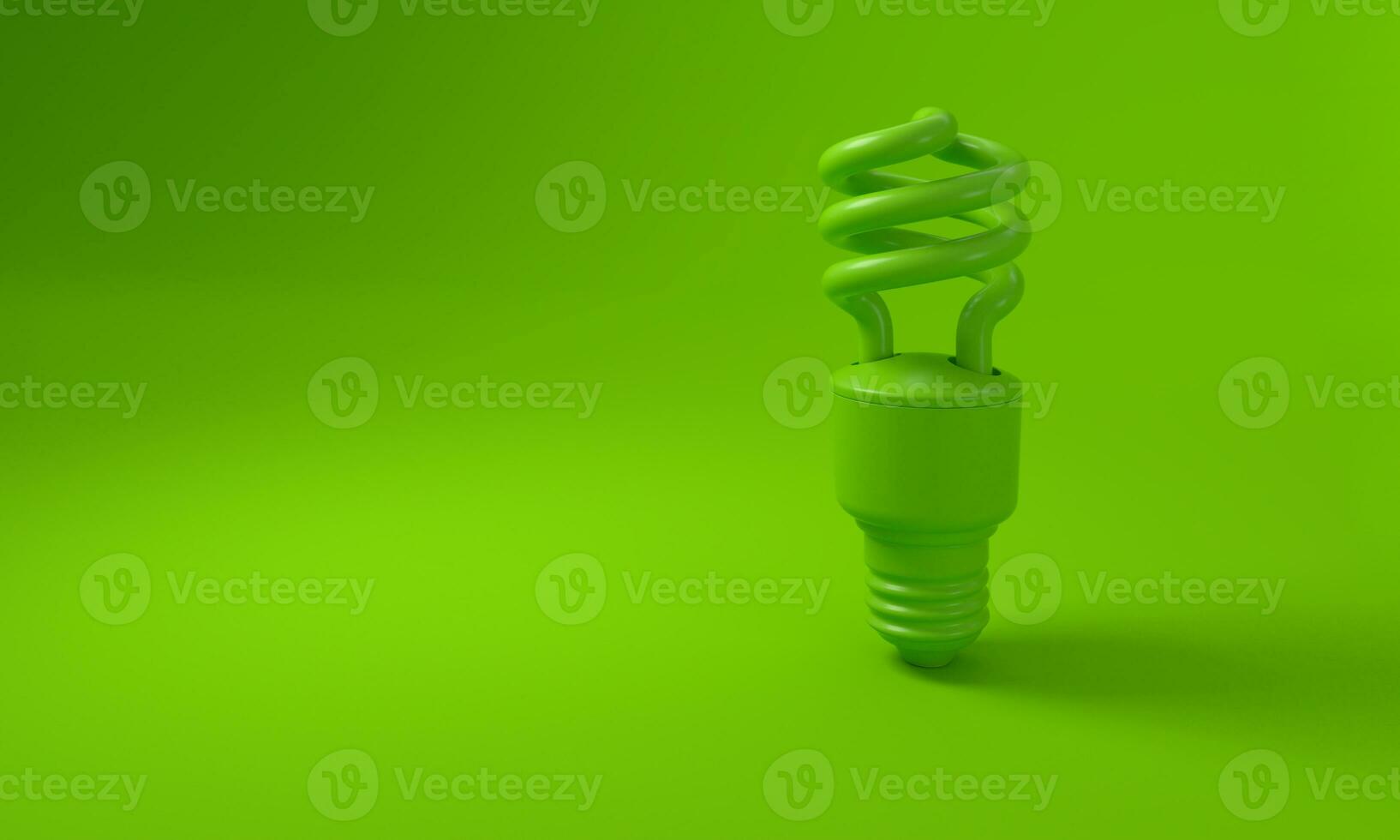 Light bulb on green background. Sustainability concept. photo