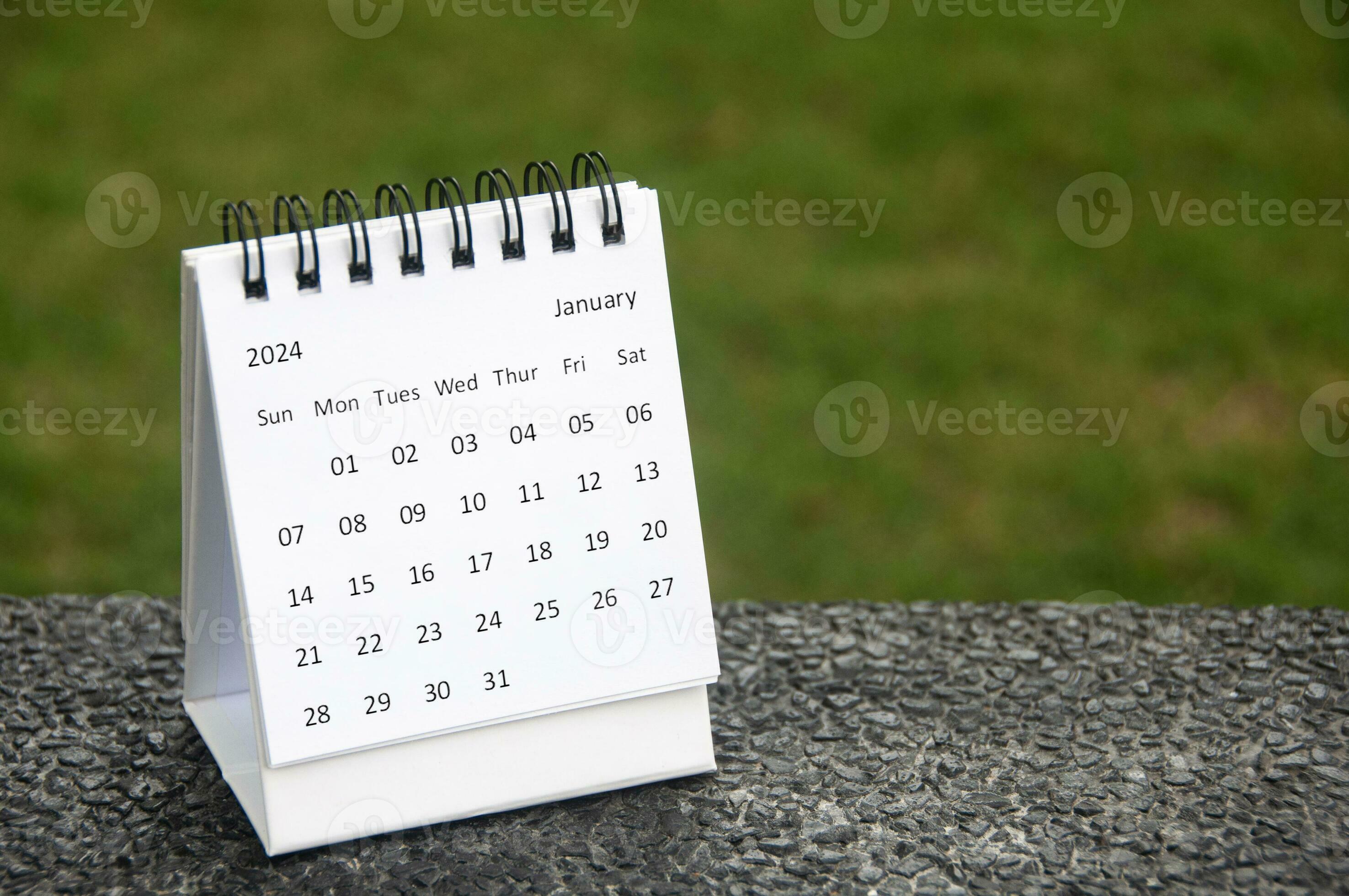 January 2024 table calendar with customizable space for text. Copy