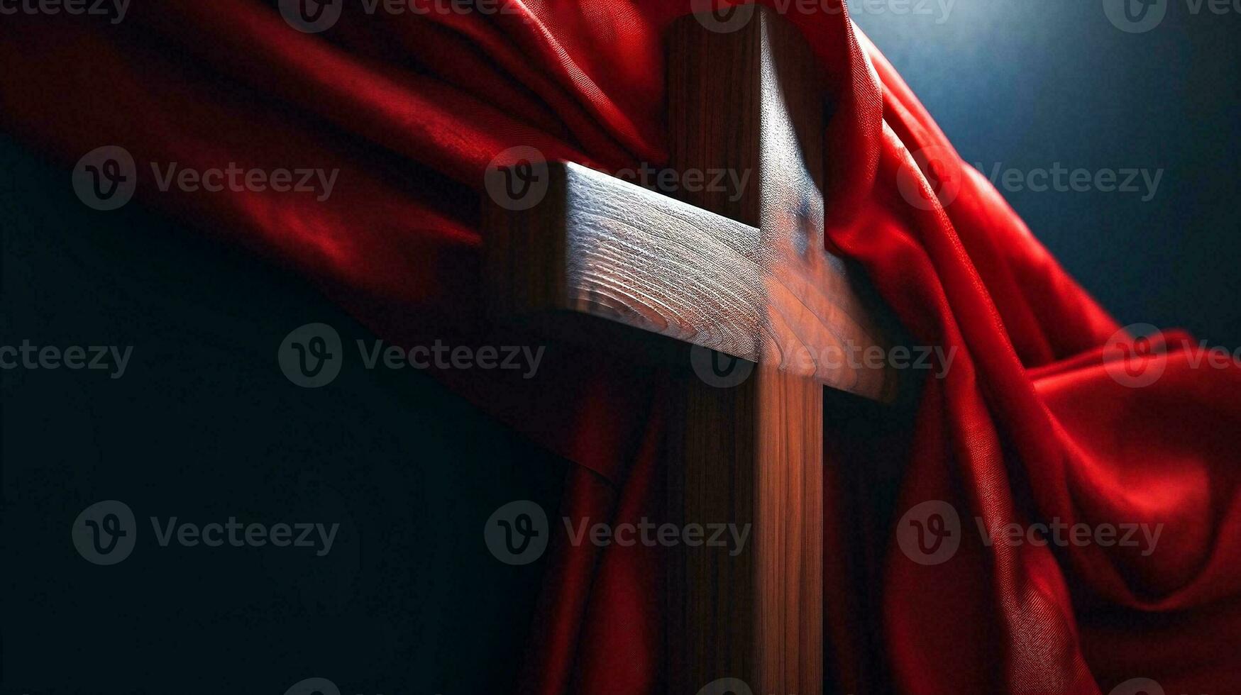 Wooden Cross of Jesus covered with red shawl. Lent season, Holy Week and Good Friday concept photo