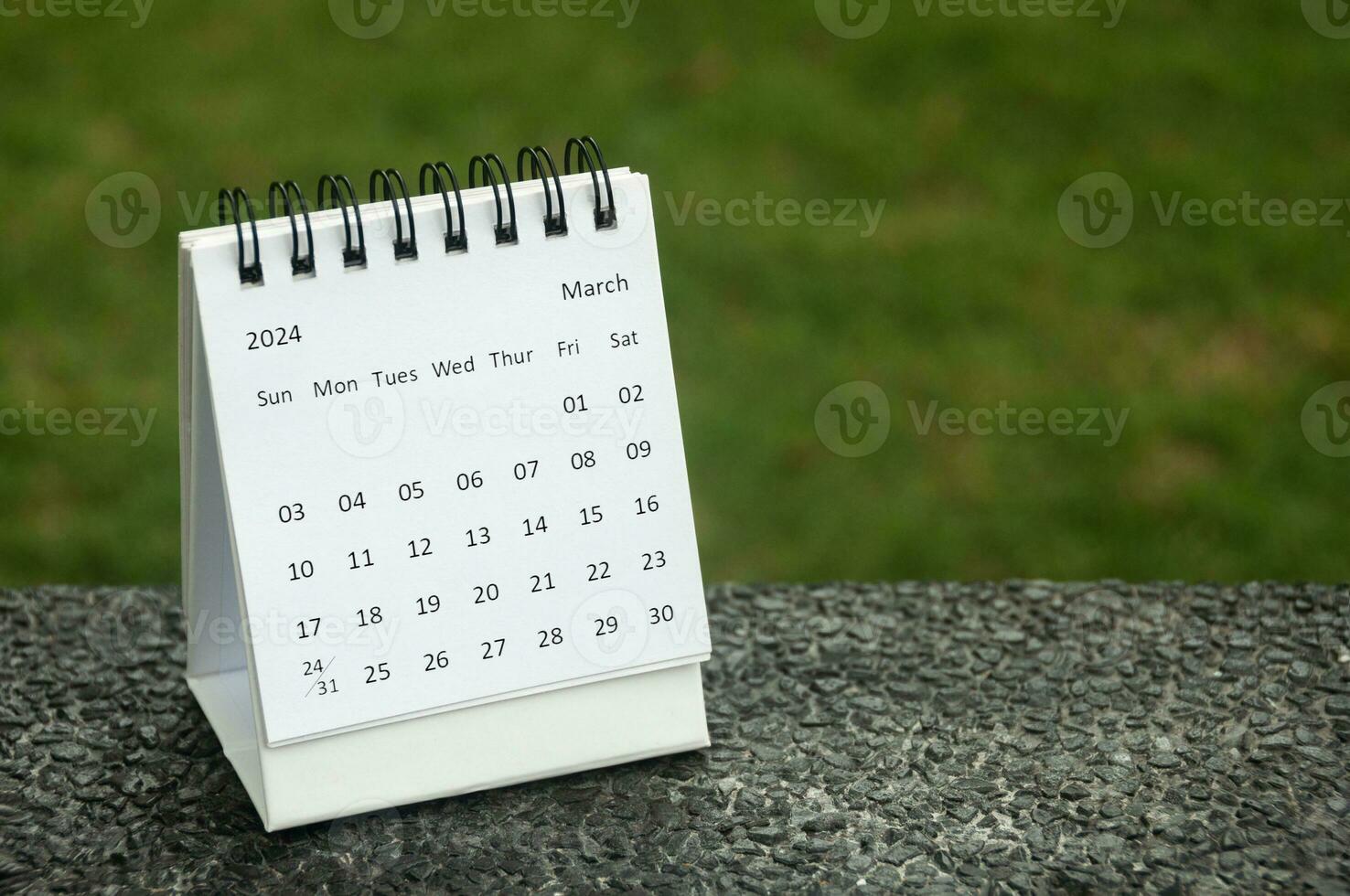 March 2024 table calendar with customizable space for text. Calendar concept and copy space. photo