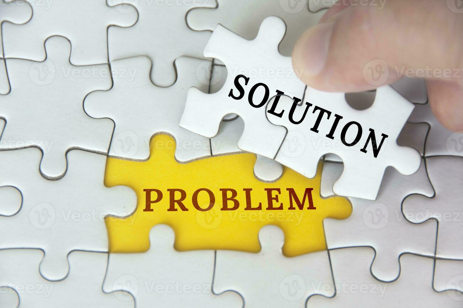 Solution to a problem text on jigsaw puzzle. Problem solving concept photo