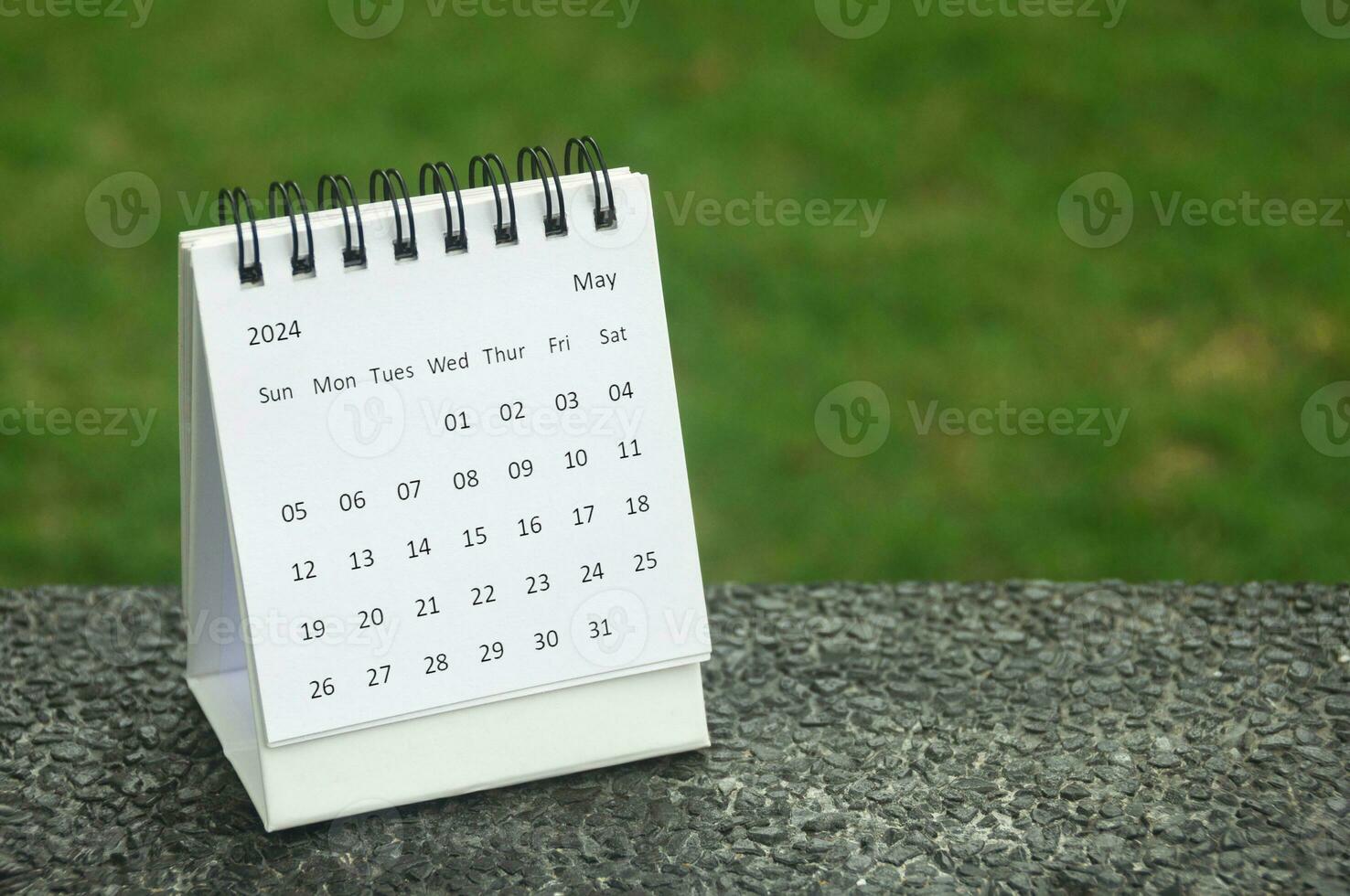 May 2024 table calendar with customizable space for text. Calendar concept and copy space. photo