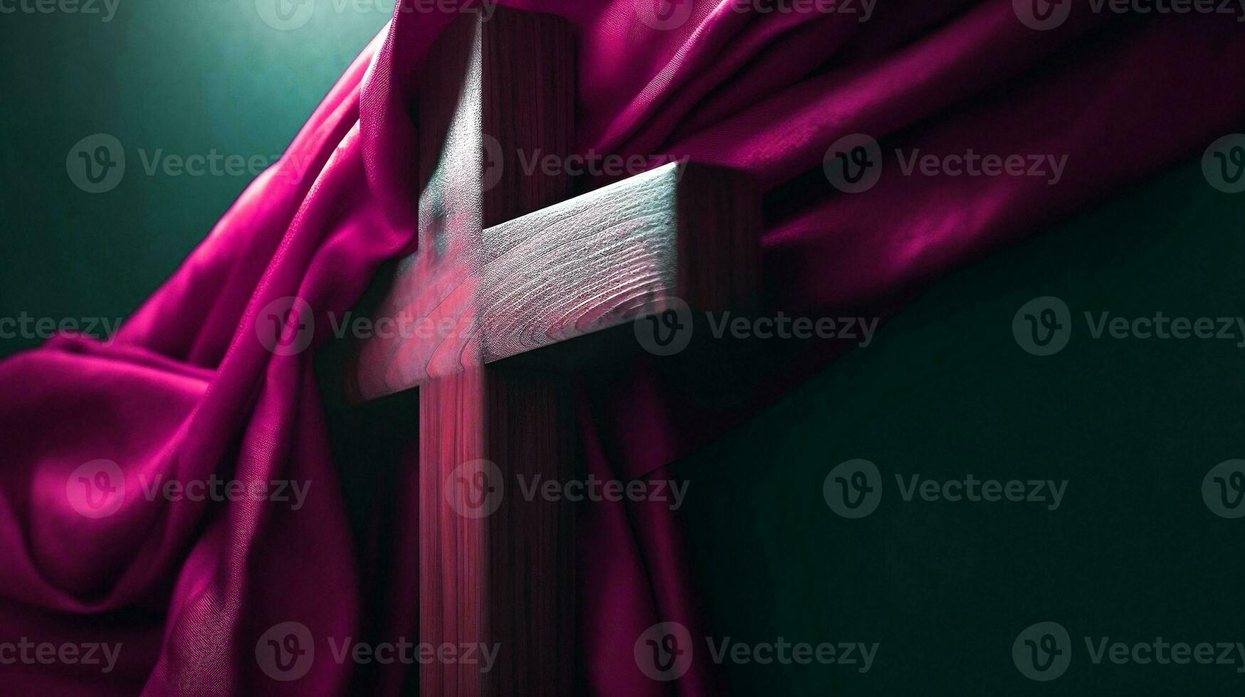 Wooden Cross of Jesus covered with purple shawl. Lent season, Holy week and Good friday concept photo