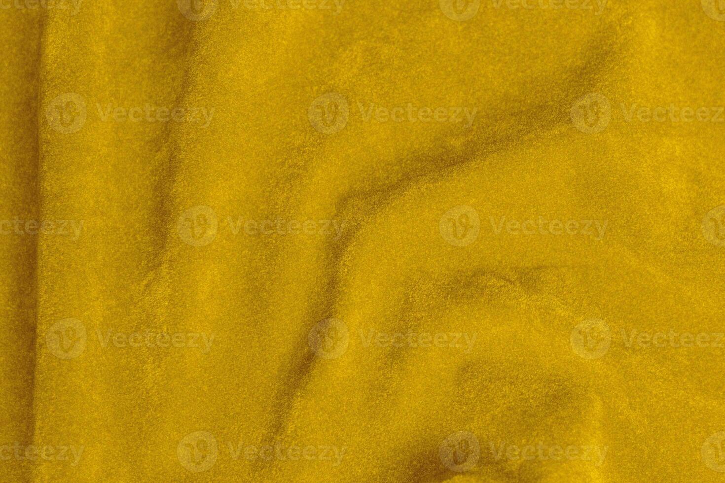 Yellow velvet fabric texture used as background. violet fabric background of soft and smooth textile material. There is space for text. photo
