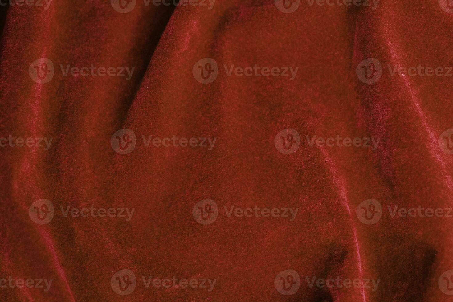 Red velvet fabric texture used as background. red fabric background of soft and smooth textile material. There is space for text. photo