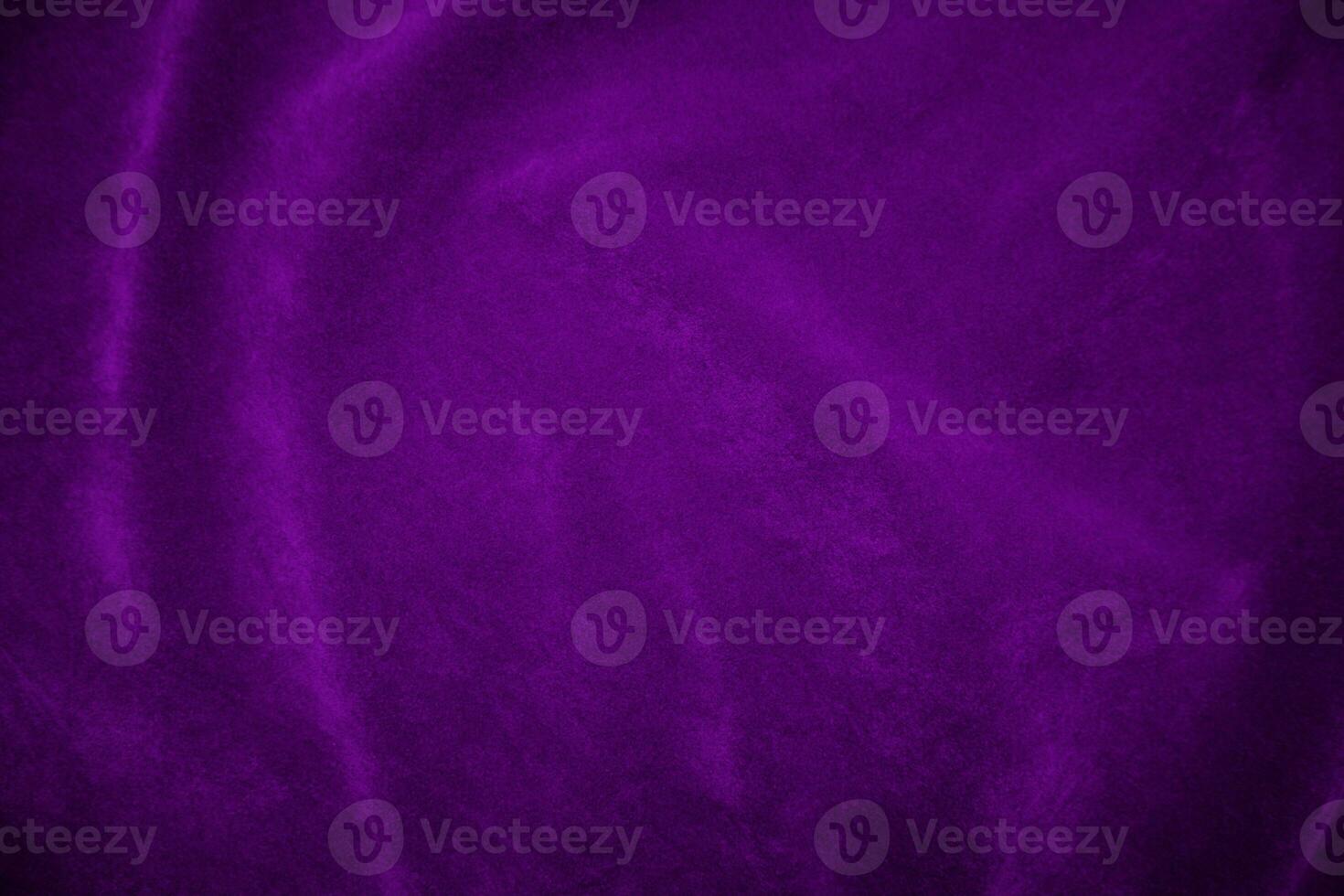 Purple velvet fabric texture used as background. Violet fabric background of soft and smooth textile material. There is space for text. photo